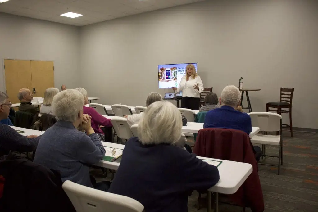 Woman teach class about the truth about owning a home as a senior citizen